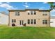 Large backyard with patio space and well maintained lawn at 1934 Acorn Ln, Dacula, GA 30019
