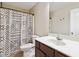 Bathroom with modern fixtures and patterned shower curtain at 1934 Acorn Ln, Dacula, GA 30019