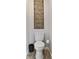 Small bathroom with a toilet, waste basket, and abstract art at 1934 Acorn Ln, Dacula, GA 30019
