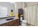 Bathroom featuring a granite vanity and a shower-tub combination at 1934 Acorn Ln, Dacula, GA 30019