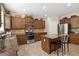 Well-lit kitchen with ample cabinetry, stainless steel appliances, and an island at 1934 Acorn Ln, Dacula, GA 30019