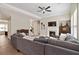 Cozy living room with a fireplace and large sectional couch at 1934 Acorn Ln, Dacula, GA 30019