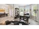 Open living space with modern furniture, a decorative cowhide rug, and plenty of natural light at 1934 Acorn Ln, Dacula, GA 30019