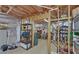 Unfinished basement area with exposed ceiling and framing, potential for workshop at 3020 Crooked Stick Dr, Cumming, GA 30041