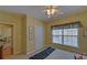 Comfortable bedroom with a full bed, ceiling fan, and a view into the hall and bath at 3020 Crooked Stick Dr, Cumming, GA 30041