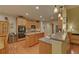 Well-equipped kitchen with stainless steel appliances and an island offers ample counter space at 3020 Crooked Stick Dr, Cumming, GA 30041