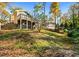 A backyard view with a wooden deck and lush green space, perfect for outdoor activities at 3020 Parkridge Ne Dr, Brookhaven, GA 30319