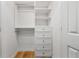 Well-organized closet with custom white shelving and drawers, maximizing storage space at 3020 Parkridge Ne Dr, Brookhaven, GA 30319