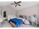 Inviting bedroom with vaulted ceilings and a bathroom at 4971 Sharp Way, Duluth, GA 30096