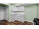 Additional kitchen storage with white cabinets, stone countertops, and subway tile backsplash at 4971 Sharp Way, Duluth, GA 30096