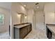 Modern bathroom features marble floors, double sinks, and decorative lighting at 11305 Knollwood Bend, Johns Creek, GA 30097