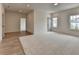 Bedroom view including entry to additional rooms and windows at 11305 Knollwood Bend, Johns Creek, GA 30097