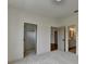 Bedroom featuring a neutral color palette, carpet flooring, and interior doors at 11305 Knollwood Bend, Johns Creek, GA 30097
