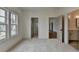 Bedroom featuring a neutral color palette, carpet flooring, and lots of natural light at 11305 Knollwood Bend, Johns Creek, GA 30097