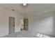 Spacious bedroom featuring neutral walls, carpet flooring, and access to another room at 11305 Knollwood Bend, Johns Creek, GA 30097