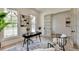 Stylish home office features lots of light, neutral walls, and an open doorway at 11305 Knollwood Bend, Johns Creek, GA 30097