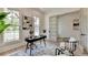Office with hard wood floors, natural light, desk and decorations at 11305 Knollwood Bend, Johns Creek, GA 30097