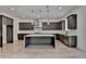 Modern kitchen features a large island, stainless steel appliances, and sleek cabinetry at 11305 Knollwood Bend, Johns Creek, GA 30097