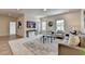 Bright living room with neutral decor, plush seating, and large windows offering bright natural light at 11305 Knollwood Bend, Johns Creek, GA 30097