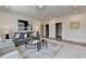 Bright living room featuring neutral tones, stylish furniture, and modern decor for a comfortable living space at 11305 Knollwood Bend, Johns Creek, GA 30097