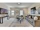 Bright living room features neutral tones, stylish furniture, and modern decor, creating a welcoming and comfortable space at 11305 Knollwood Bend, Johns Creek, GA 30097