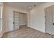 Bright office space featuring modern wood-look floors and beautiful french doors at 11305 Knollwood Bend, Johns Creek, GA 30097