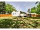 Spacious backyard featuring a well-maintained lawn and a wooden privacy fence at 2195 Penelope Nw St, Atlanta, GA 30314