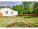 Large backyard with grass and a wooden fence creating a private outdoor space at 2195 Penelope Nw St, Atlanta, GA 30314