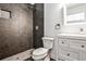 Modern bathroom features a tiled walk-in shower, contemporary fixtures, and vanity at 2195 Penelope Nw St, Atlanta, GA 30314
