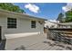 Spacious gray deck with wooden railings, perfect for outdoor entertaining at 2195 Penelope Nw St, Atlanta, GA 30314