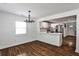 Bright and modern kitchen featuring quartz countertops, stainless steel appliances, and a sliding barn door at 2195 Penelope Nw St, Atlanta, GA 30314