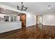 Open-concept space with a kitchen bar and hardwood floors, great for modern living at 2195 Penelope Nw St, Atlanta, GA 30314