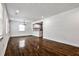 Spacious living area leading into the kitchen with hardwood floors and abundant natural light at 2195 Penelope Nw St, Atlanta, GA 30314
