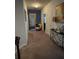 Upper level hallway decorated with art and mirrors, creating an inviting space at 292 Aylesbury Blvd, Mcdonough, GA 30252