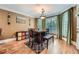 Cozy dining area featuring hardwood floors, natural light, and seating for four at 1025 Ector Nw Dr, Kennesaw, GA 30152