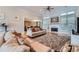 Inviting living room featuring a cozy fireplace, hardwood floors, and an open view into the adjacent kitchen at 1025 Ector Nw Dr, Kennesaw, GA 30152