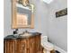 Chic powder room featuring designer vanity and stylish mirror at 1025 Ector Nw Dr, Kennesaw, GA 30152