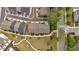 Overhead shot of well-maintained townhomes with manicured lawns and landscaped grounds in a suburban neighborhood at 2066 Patterson Park Rd, Decatur, GA 30033