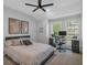 Cozy bedroom featuring a ceiling fan and desk with great natural light, ideal for a home office at 2066 Patterson Park Rd, Decatur, GA 30033
