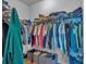 Walk-in closet featuring ample hanging space and storage containers for organization at 2066 Patterson Park Rd, Decatur, GA 30033