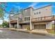 Modern townhome featuring a private garage and outdoor decks on each unit, offering a great outdoor living space at 2066 Patterson Park Rd, Decatur, GA 30033