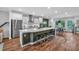 Spacious kitchen with stainless steel appliances, large center island, and adjacent dining area at 2066 Patterson Park Rd, Decatur, GA 30033