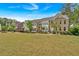 Well-manicured lawn and attractive townhouses offer picturesque suburban living at 2066 Patterson Park Rd, Decatur, GA 30033