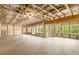 Unfinished basement with exposed framing and lots of windows at 4039 Tallow Pl, Woodstock, GA 30188