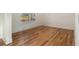 Cozy bedroom featuring hardwood floors, a neutral color palette, and ample natural light at 4039 Tallow Pl, Woodstock, GA 30188