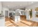 Open-concept kitchen with an island, modern appliances, and lots of light at 4039 Tallow Pl, Woodstock, GA 30188