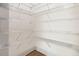 Walk-in pantry with wire shelves for organized storage at 4039 Tallow Pl, Woodstock, GA 30188