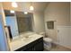 This bathroom has a vanity sink, mirror, toilet, and a shower/tub combo to give a complete look at 7165 Winthrop Rd, Alpharetta, GA 30005