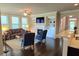 Cozy living room with hardwood floors, fireplace, and built-in shelving; great natural light at 7165 Winthrop Rd, Alpharetta, GA 30005