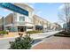 Street view of Avalon Blvd showcasing retail shops like Lululemon and well-maintained landscaping at 7165 Winthrop Rd, Alpharetta, GA 30005
